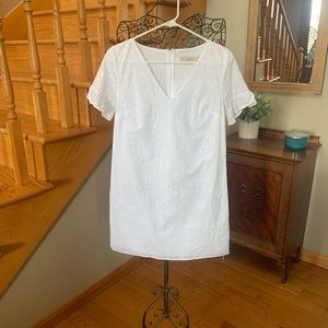 Very cute white, eyelet LOFT dress. Never worn. Size 0.